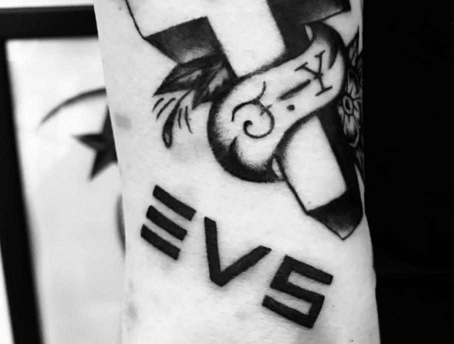 EVS logo tattoo